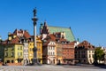 Panoramic view of Royal Castle Square - Plac Zamkowy - in Starowka Old Town with Sigismund III Waza Column and historic tenement Royalty Free Stock Photo