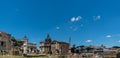 Panoramic view of the ruins of the forum of the time of the Roman Empire, with tourists visiting it