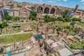 Panoramic view of the ruins of the forum of the time of the Roman Empire, with tourists visiting it