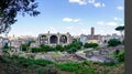 Panoramic view of the ruins of the forum of the time of the Roman Empire, with tourists visiting it