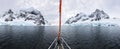 Panoramic view of sailboat bow in Lemaire Channel in Antarctica Royalty Free Stock Photo