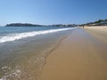 Panoramic view of sandy beach at bay of ACAPULCO city in Mexico with tourists and beautiful waves of Pacific Ocean Royalty Free Stock Photo