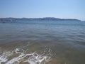 Panoramic view of sandy beach at bay of ACAPULCO city in Mexico with tourists and steady waves of Pacific Ocean Royalty Free Stock Photo