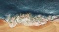 Panoramic view of the sandy beach. Sandy beach, panorama. The sea wave rolls on the shore. Sea coast view from the air. Royalty Free Stock Photo