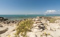 Panoramic view of a sandy and rocky beach. Royalty Free Stock Photo