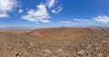 Panoramic view on Santa Barbara Castle on Lanzarote with volcano crater in foreground Royalty Free Stock Photo