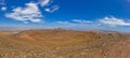 Panoramic view on Santa Barbara Castle on Lanzarote with volcano crater in foreground Royalty Free Stock Photo