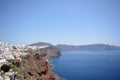 Panoramic view, Santorini island, Traditional and famous white houses and churches with blue domes over the Caldera, Aegean sea. Royalty Free Stock Photo