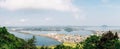 Panoramic view of sea and city from Seongsan Ilchulbong Tuff Cone in Jeju Island, Korea Royalty Free Stock Photo