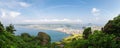 Panoramic view of sea and city from Seongsan Ilchulbong Tuff Cone in Jeju Island, Korea Royalty Free Stock Photo