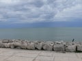 A panoramic view of sea horizon at caorle venice italy city seafront rock Royalty Free Stock Photo