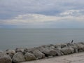 A panoramic view of sea horizon at caorle venice italy city seafront rock Royalty Free Stock Photo
