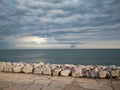 A panoramic view of sea horizon at caorle venice italy city seafront rock Royalty Free Stock Photo