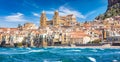 Panoramic view from sea to sandy beach in Cefalu, town in Italian Metropolitan City of Palermo located on Tyrrhenian coast of Royalty Free Stock Photo