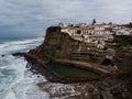 Panoramic view of seaside town Azenhas do Mar at cliff coast beach atlantic ocean in Sintra Colares Portugal