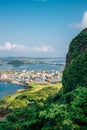 Panoramic view of seaside village from Seongsan Ilchulbong Tuff Cone in Jeju Island, Korea Royalty Free Stock Photo