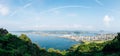 Panoramic view of seaside village from Seongsan Ilchulbong Tuff Cone in Jeju Island, Korea Royalty Free Stock Photo