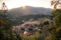 Panoramic view of the setting sun and Tianluokeng Tulou, Fujian, China