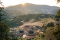 Panoramic view of the setting sun and Tianluokeng Tulou, Fujian, China