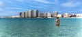 Panoramic view of sexy tourist on the blue seagull beach of Cancun city in the Mayan Riviera of Mexico