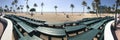 Panoramic View Shows Stacked Picnic Tables And Empty Florida Beach