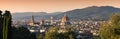 Panoramic view of the skyline of the city of Florence at sunset from the hills near Piazzale Michelangelo. Giotto`s bell tower an Royalty Free Stock Photo