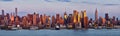 Panoramic view, skyscrapers of Midtown at sunset with the Hudson River. Manhattan, New York City Royalty Free Stock Photo