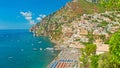 Panoramic view of small coastal european city with mountains