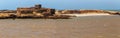 Panoramic view of the small island with ruins of the ancient fortress near the Atlantic coast in the Essaouira on a sunny summer Royalty Free Stock Photo