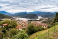 Panoramic view from small village Cadegliano Viconago of lake Lugano and Swiss Alps. Royalty Free Stock Photo