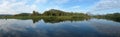 Panoramic view: Snake River reflecting the Rocky Mountains and the sky Royalty Free Stock Photo