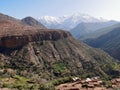 Panoramic view of snow-capped High Atlas Mountains in Ourika valley, Morocco. Royalty Free Stock Photo