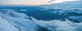 Panoramic view of snow-capped mountains in the early morning Royalty Free Stock Photo