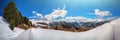 Panoramic view on snowy peaks of Alps mountains Royalty Free Stock Photo