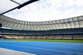 Panoramic view of soccer field stadium and stadium seats. Royalty Free Stock Photo