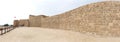 A panoramic view of Southern wall at the upper leve of ancient Bahrain Fort Royalty Free Stock Photo