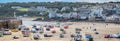 Panoramic view of St Ives Harbour at low tide with grounded boats in St Ives, Cornwall, UK Royalty Free Stock Photo