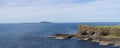 Panoramic view on Staffa Island and Fingals Cave or The Giants Causeway off the coast of Scotland