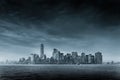 Panoramic view of storm over Lower Manhattan from Ellis Island at dusk, New York City.