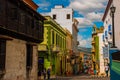 Panoramic view of street with crumbling buildings and view on a bay in Santiago de Cuba , Cuba Royalty Free Stock Photo