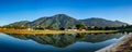 Panoramic view of a sunrise at Parque del Este with the Avila. Royalty Free Stock Photo