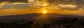 Panoramic view at the sunset above the Tuscany countryside from Volterra in Italy Royalty Free Stock Photo