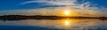 Panoramic view of sunset with beautiful skyline over lake Zorinsky Omaha Nebraska