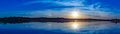 Panoramic view of sunset with beautiful skyline over lake Zorinsky Omaha Nebraska Royalty Free Stock Photo