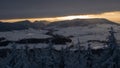 Panoramic view of sunset from Borowa Gora view point during winter time. Frosty structure, glazed, icy branches. Royalty Free Stock Photo