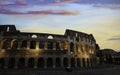 Panoramic view of sunset in Colosseum in Rome, Italy. Rome architecture and landmark. Rome Colosseum is one of the main Royalty Free Stock Photo