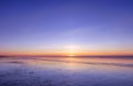 Panoramic view of sunset over ocean. Nothing but sky, clouds and water. Beautiful serene scene Royalty Free Stock Photo