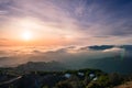 Panoramic view of a sunset over a sea of clouds covering south San Francisco bay area; beautiful rolling hills in the foreground; Royalty Free Stock Photo