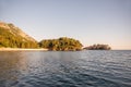 Panoramic view of Sveti Stefan in Montenegro at pink sunset. Famous tourist place near Budva Natural Royalty Free Stock Photo