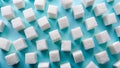 Panoramic View of a Sweet Sugar Cube Pile on a Pastel Blue Background A Delightful Visual for Baking Royalty Free Stock Photo